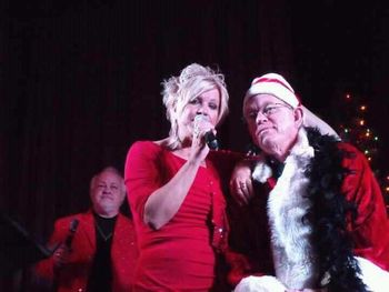 KJ and her Santa Clause (Charlie) for Santa Baby. He also took care of catering for that show, so to us he was a true Santa!
