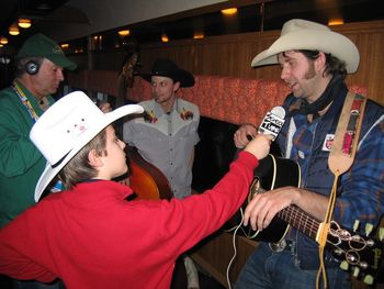 Gettin' interviewed by a young reporter at the Olympics in Vancouver, 2010
