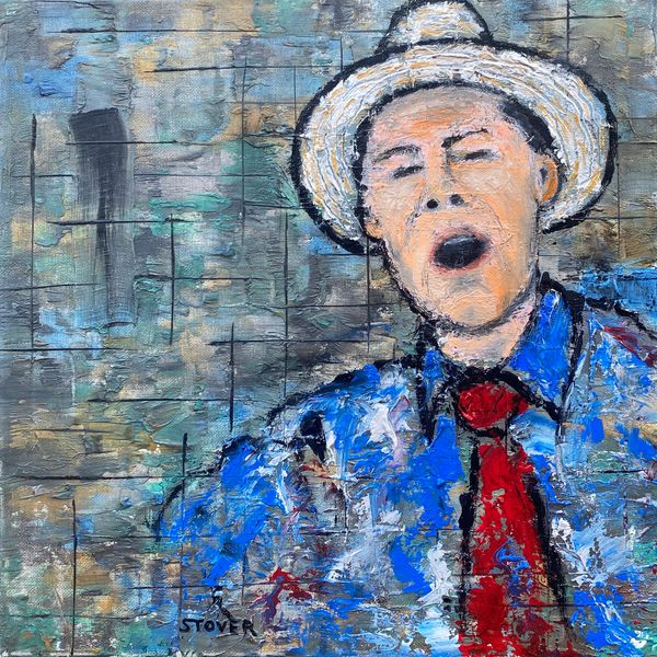 Man with hat singing 