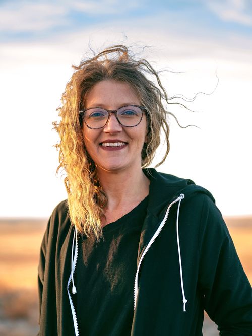 a close up photo of one of the female instructors as a head-shot for their profile