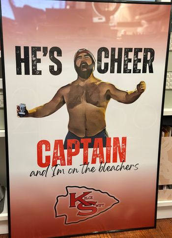 IMAGE CREDIT: Gina Crosley-Corcoran, Burning Red

ART CREDIT: "He's Cheer Captain" graphic art by MagicalMocksCo (Etsy)
"Kelce Swift" logo by ODonnellOriginals (Etsy)
