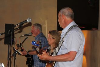 The Back Pages trio performing live — Dave Fitch, Melissa Clark and Rob Kraft
