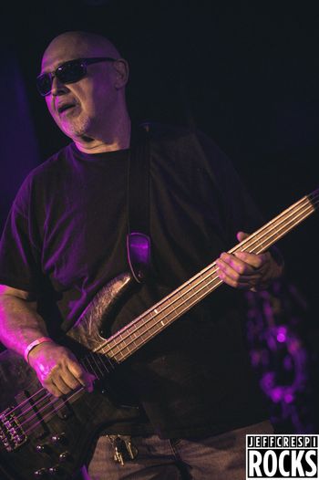 The groove starts here. Jose, co-founder of NFINITI, holding down the low end. Photo by Jeff Crespi
