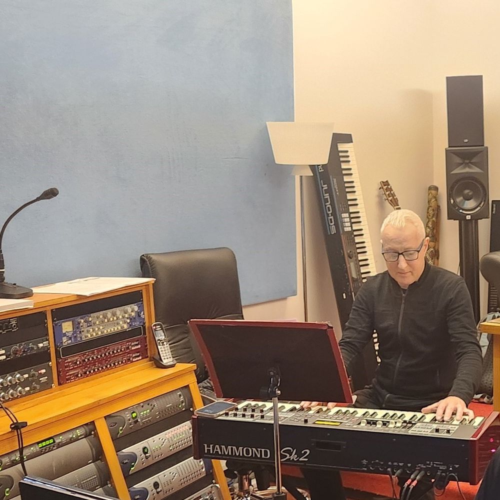 Gary 'The Gaz' Taylor, keyboardist for The Charlie Tango Project, playing synthesizer