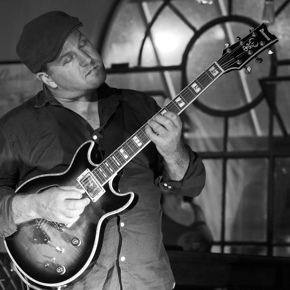 Nick Granville, guest guitarist for The Charlie Tango Project, performing with his electric guitar
