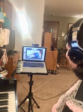 Teaching an online lesson to a young school-aged student
