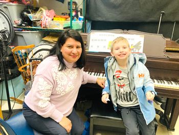 Teaching a student who loves his piano lessons!  Through my studio’s community initiative, Marcheselli Music Tree, I provide piano lessons to Massachusetts public school students and their families. This program is made possible, in part, by a grant from the Otis Cultural Council, a local agency supported by the Mass Cultural Council.
