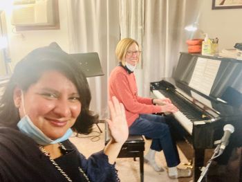With a retiree who has studied with me for years since she was an absolute beginner, and now enjoys playing Bach.
