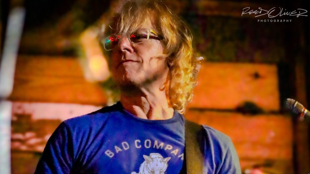 Kerry Drew performing live acoustic music at a brewery in Hartwell, Georgia.