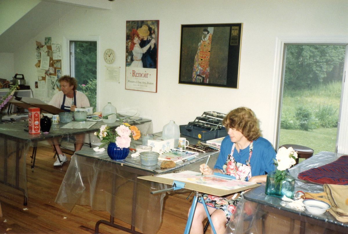 Gene and Karen with paintings