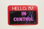 "Hello, I'm IN CONTROL" name tag sticker