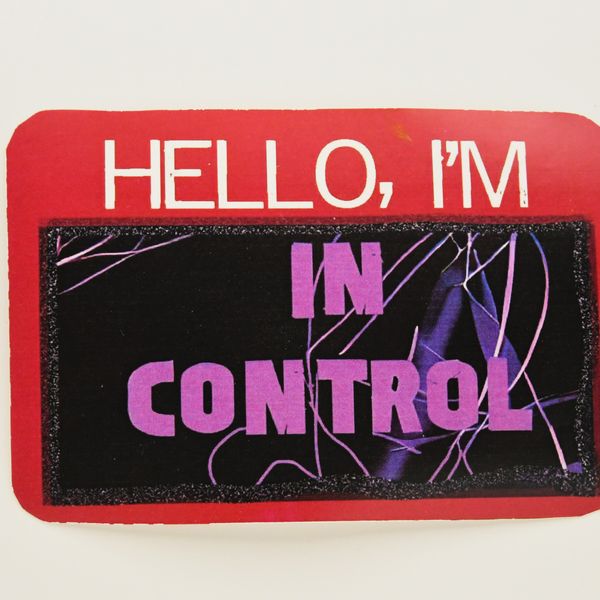 "Hello, I'm IN CONTROL" name tag sticker