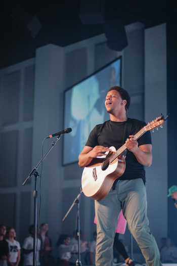 Leading worship from guitar
