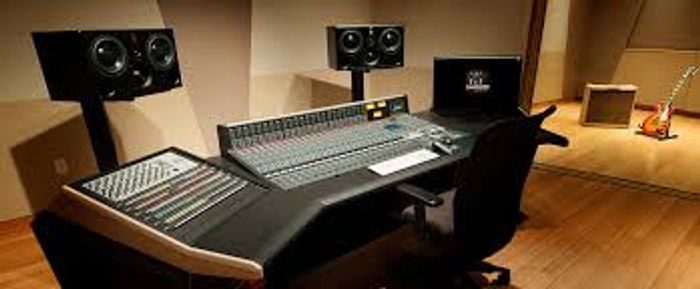 Quinn Records TM recording studio in St. Louis, Missouri, with mixing console and studio monitors