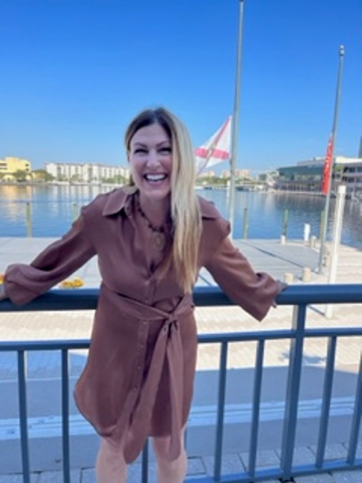 Pamela Dio laughing by the waterfront