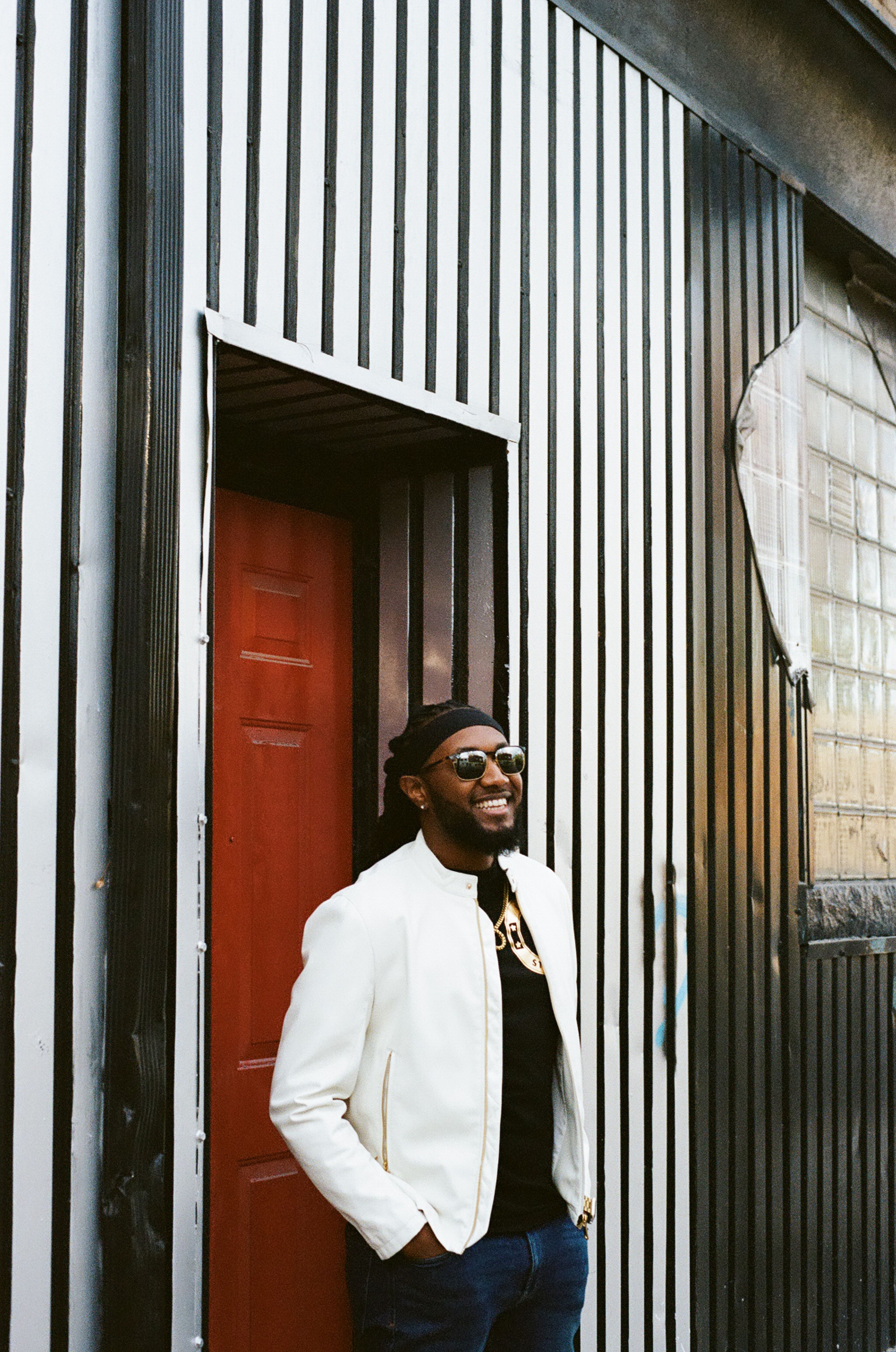 Luckystickz in a white jacket