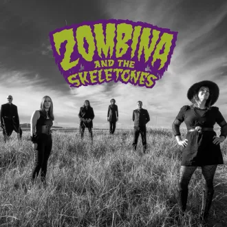 Horrorpunk band Zombina and the Skeletones in a vibrant horror-punk promo photo inspired by B-movie monsters, retro sci-fi horror and catchy punk energy with a playful macabre edge.