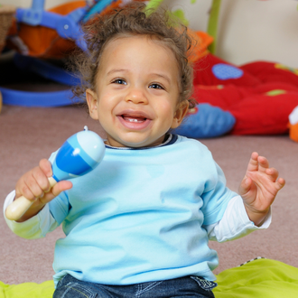 infants and toddler playing with music instruments