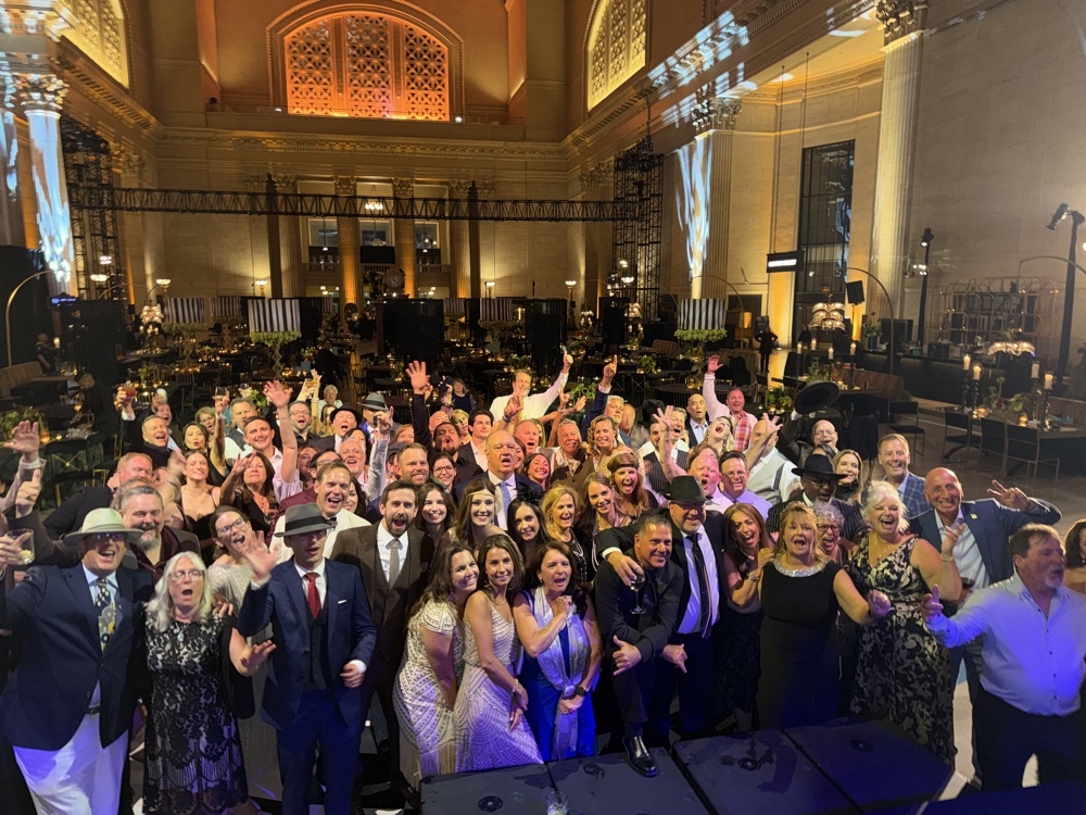 Perfect 10 Band crowd packed dance floor at Chicago Union Station Great Hall corporate gala⁠