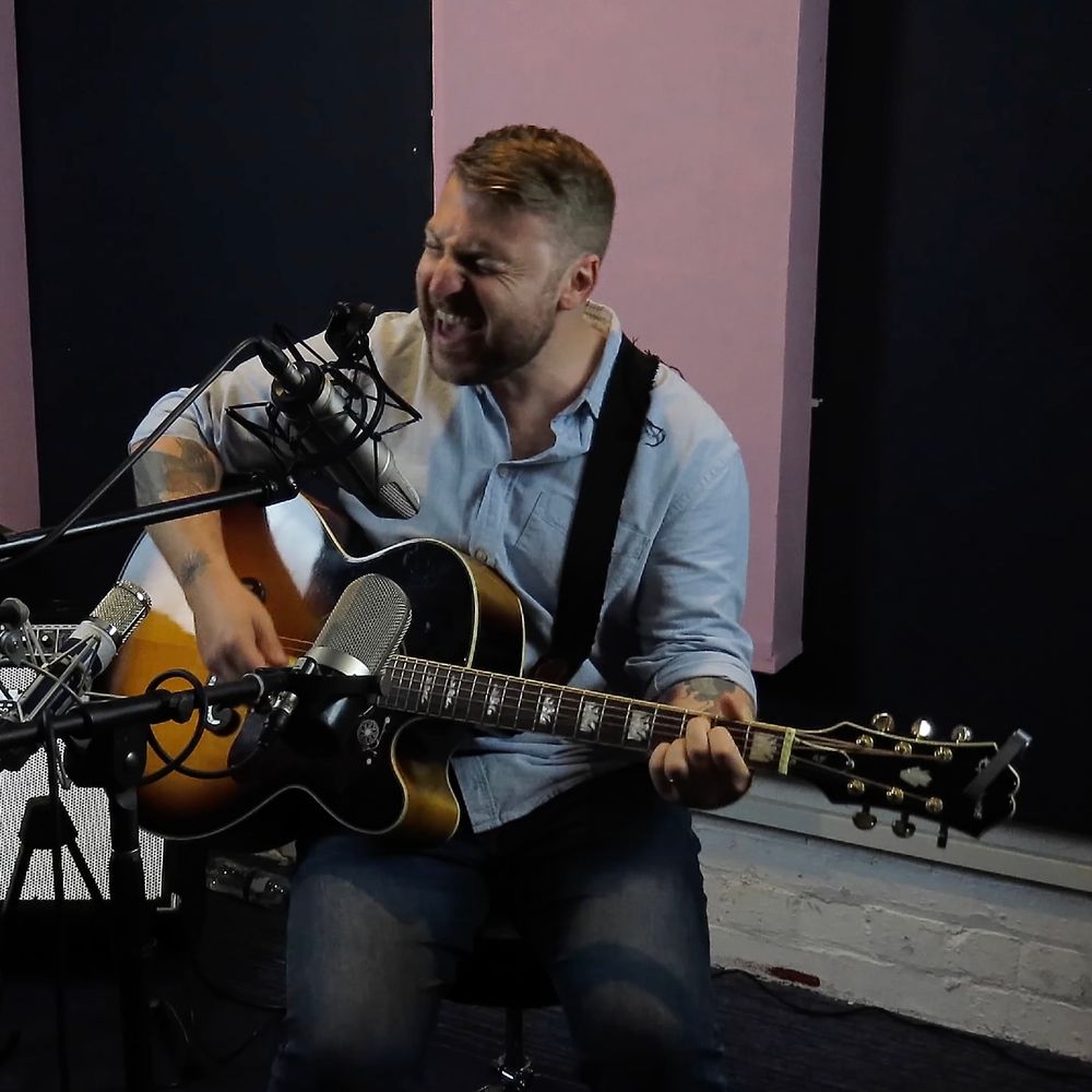 Singer-songwriter recording live at Big Pink Music, Warrington’s professional recording studio. High-quality recording services for solo artists in the North West UK, capturing authentic soun