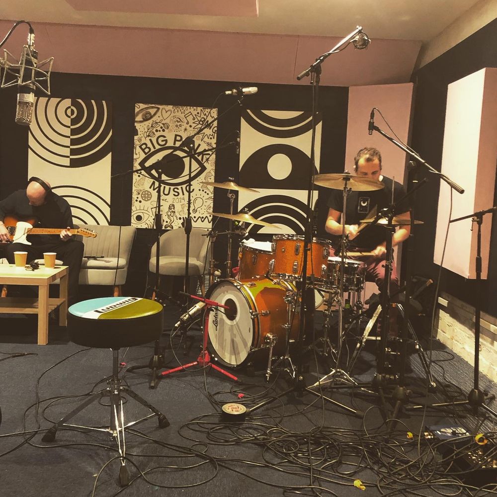 A band recording live at Big Pink Music, Warrington’s affordable recording studio. Professional production, mixing, and mastering services for musicians in the North West.