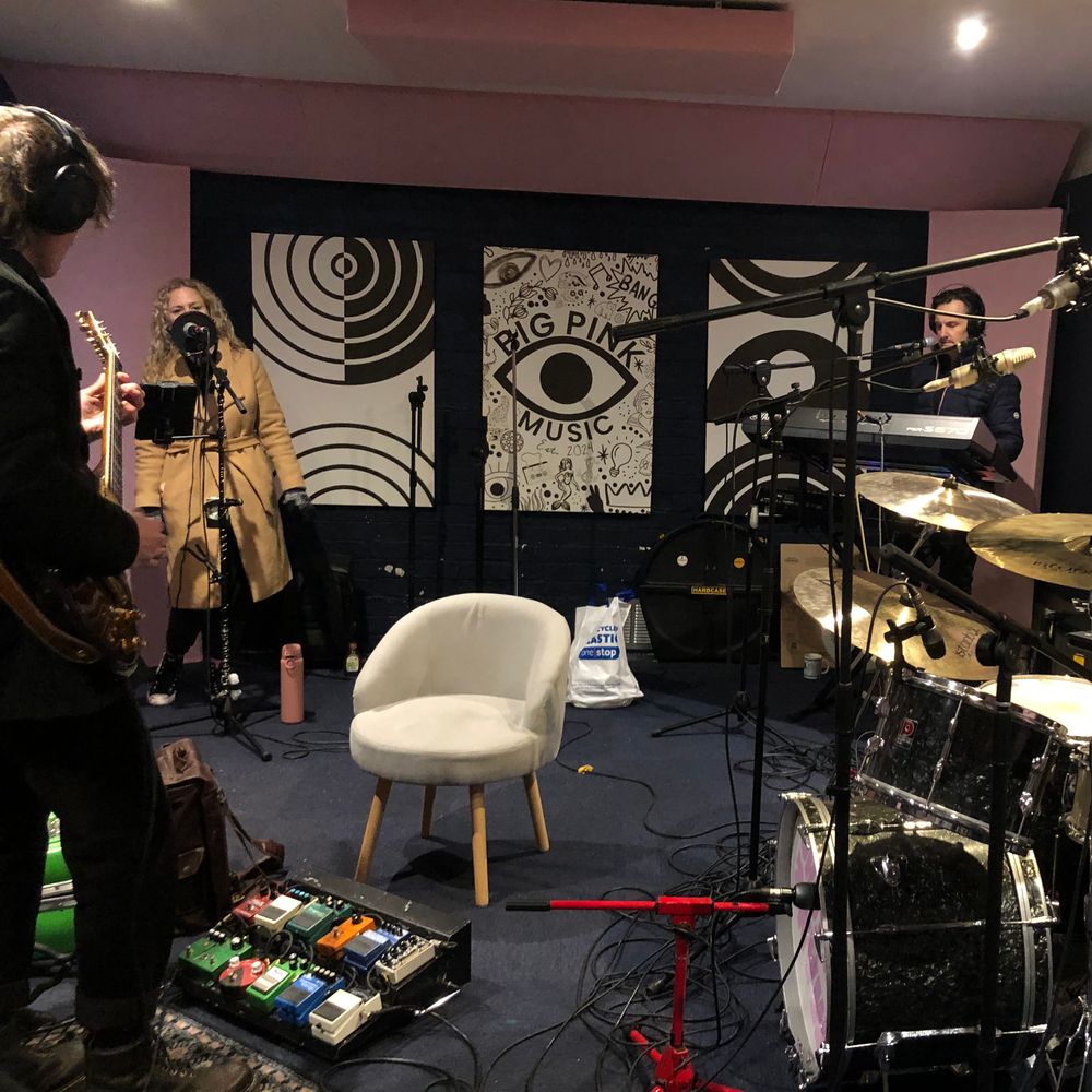 A band recording live at Big Pink Music, a music studio in Warrington, North-West UK