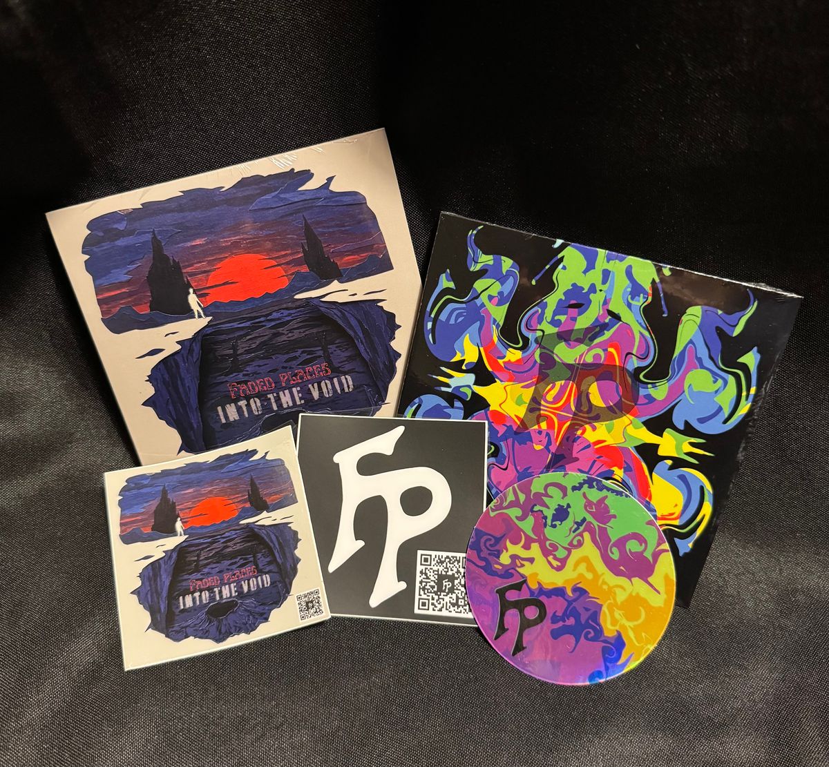 Vinyl + Sticker Pack and 2 EP's