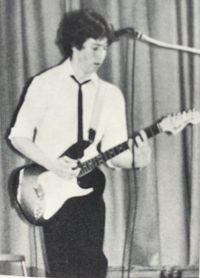 Andrew playing a nice barre chord during his High School Talent Show - and yes, the same Stratocaster he is still playing with Andrew McKnight & Beyond Borders!