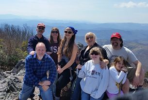 Andrew & Beyond Borders family high atop Big Pinnacle in Grayson Highlands State Park, Virginia