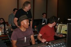 Opetaia and Mark Mancina recording vocals for Moana